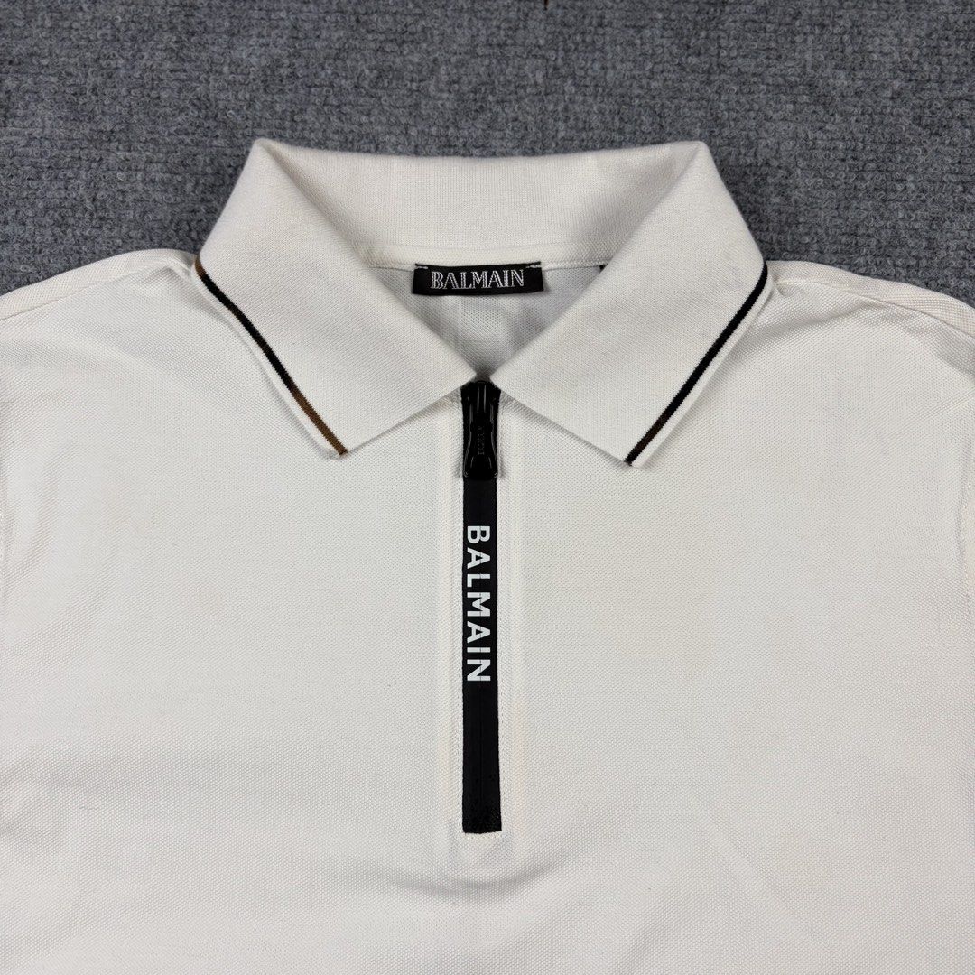 Balmain Halfzip Polo Shirt (Category: Luxury Apparel) located in Manila. Submitted by yourtherapist_ (Listing ID 1464708784, Image 3). Description: Balmain Halfzip Polo Shirt Size: S Condition: Excellent Material: 100% Cotton Measurements Width: 19 Length: 25 Shoulder: 15 2,500.