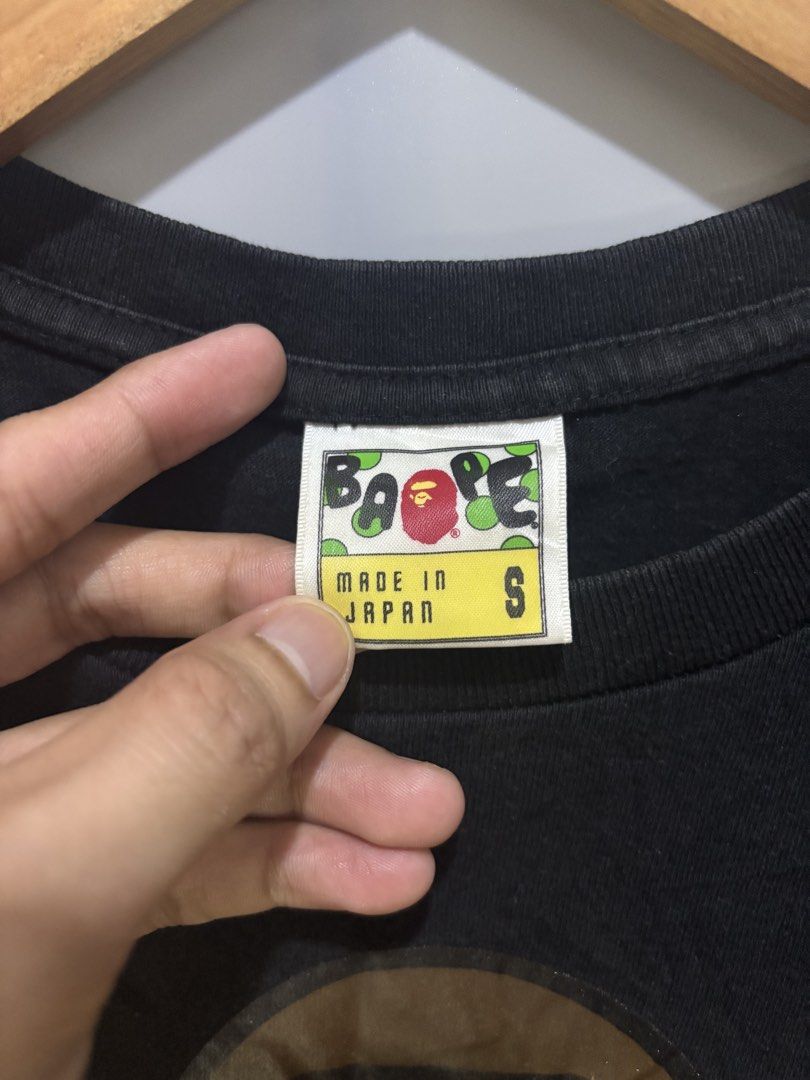 BAPE BABY MILO (Category: Tshirts & Polo Shirts ) located in Bayambang. Submitted by lo_keythrifting (Listing ID 1464598488, Image 2). Description: - Authentic Black BAPE T-Shirt - Condition: Excellent condition - Dimes: 18.5*24 - Color rate: 9.5/10 - Issue: Minimal hairline sa likod see last pic - Features the iconic BABY MILO graphic - Made from 100% premium cotton - Proudly Made in Japan - Size: Small (S) - A must-have for any BAPE enthusiast 