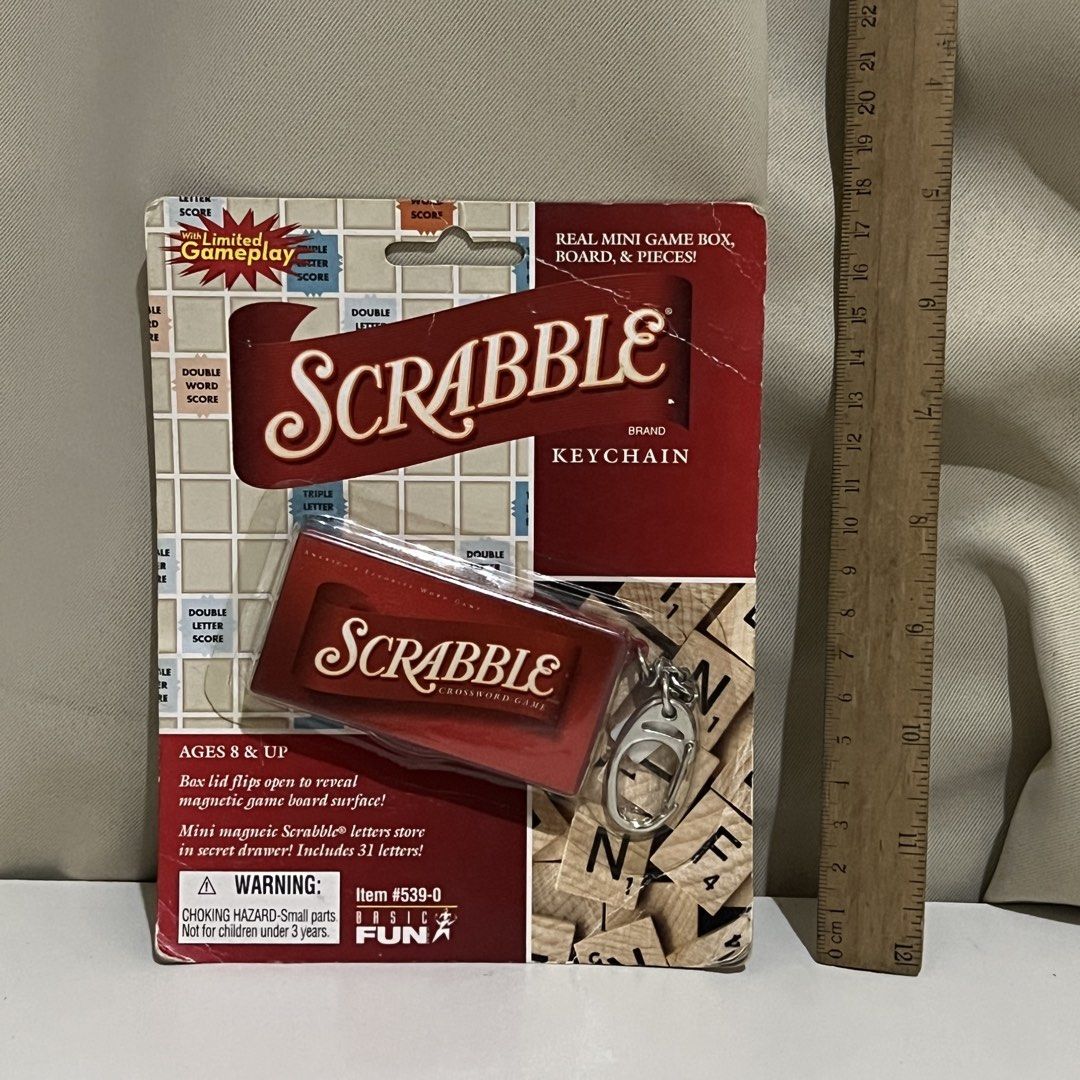 Basic Fun Scrabble Brand Keychain Mini Game Box Board (Category: Board Games & Puzzles) located in Manila. Submitted by nikaniks25 (Listing ID 1464717143, Image 3). Description: Has scratch marks sa likod ng packaging.