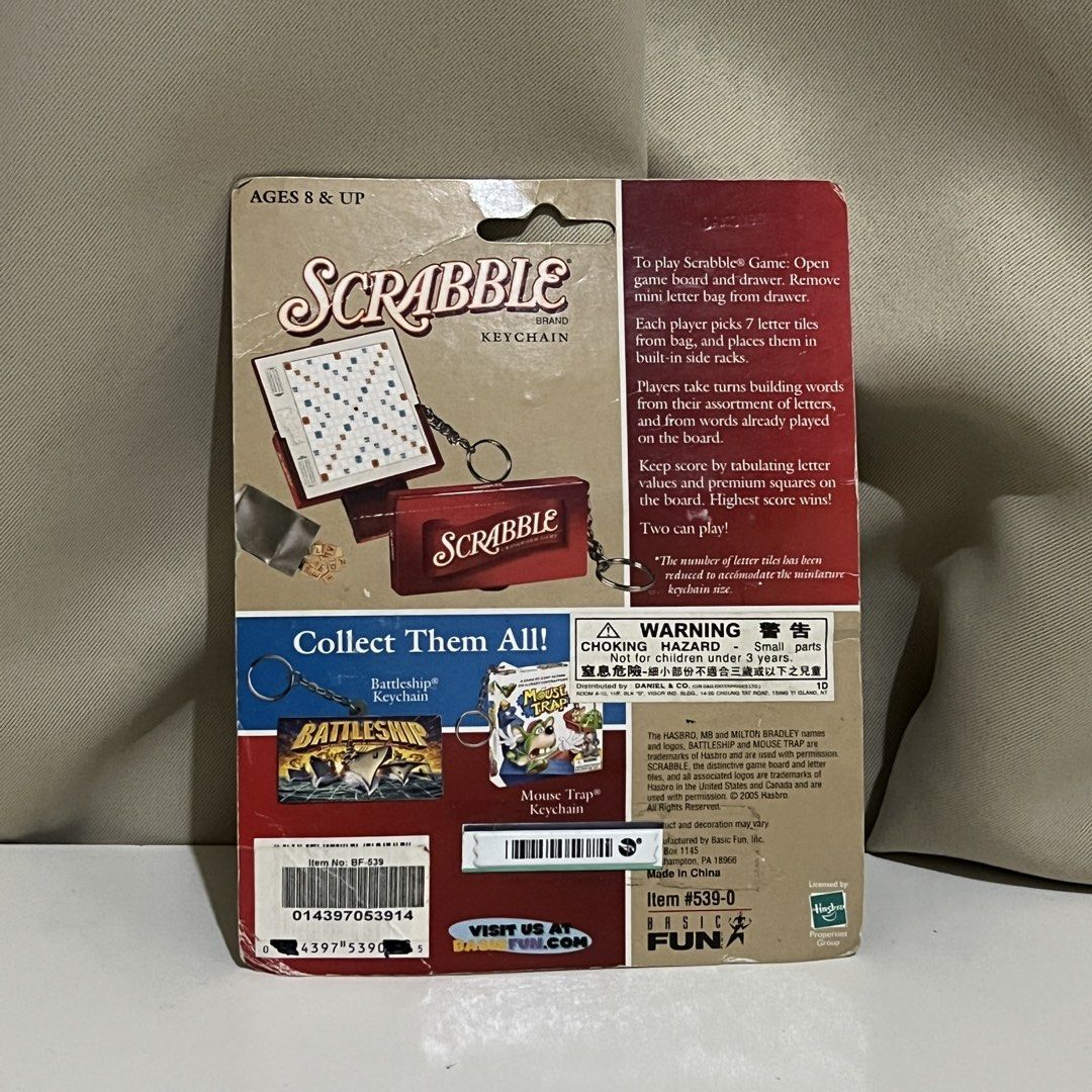 Basic Fun Scrabble Brand Keychain Mini Game Box Board (Category: Board Games & Puzzles) located in Manila. Submitted by nikaniks25 (Listing ID 1464717143, Image 2). Description: Has scratch marks sa likod ng packaging.
