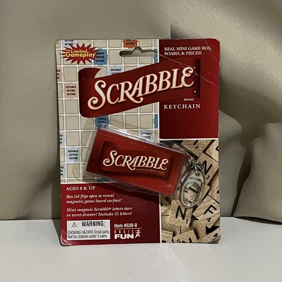 Basic Fun Scrabble Brand Keychain Mini Game Box Board (Category: Board Games & Puzzles) located in Manila. Submitted by nikaniks25 (Listing ID 1464717143, Image 1). Description: Has scratch marks sa likod ng packaging.