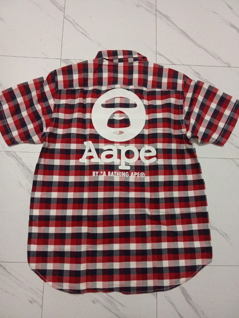 Bathing Ape by Aape Checkered Polo (Category: Tshirts & Polo Shirts ) located in Manila. Submitted by christoph17 (Listing ID 1464588896, Image 2). Description: great condition thrifted medium fits men's.