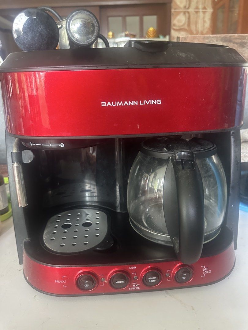 Baumann Living Red Espresso and Drip Coffee Maker (Category: Coffee Machines & Makers) located in Amadeo. Submitted by maricarkim (Listing ID 1464617214, Image 3). Description: - Red Baumann Living coffee maker - Brews both espresso and drip coffee - Features a steam function - Includes glass carafe - Some signs of wear on the exterior.