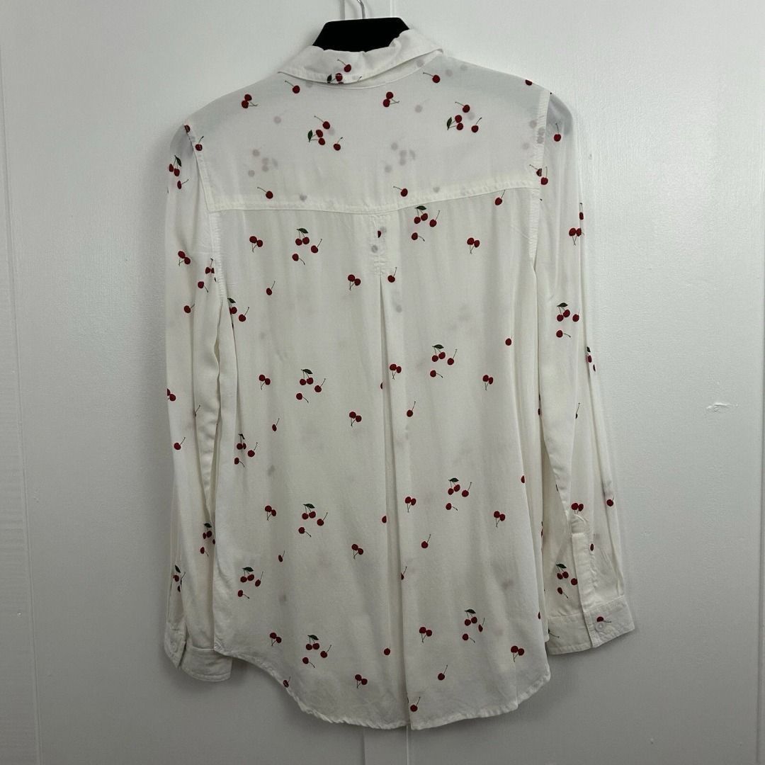 BEACHLUNCHLOUNGE CHERRY WHTE LONG SLEEVES TOP (Category: Longsleeves) located in Marikina City. Submitted by minimalistmanila (Listing ID 1464734366, Image 3). Description: beachlunchlounge white long sleeves. With cherry design. Fits S/M, armpit to armpit 19 inches and front length 27 and 29 inches back. With tags. 100% viscose soft fabric. Bought in Nordstrom USA. Might require ironing as kept in storage. Order now! .