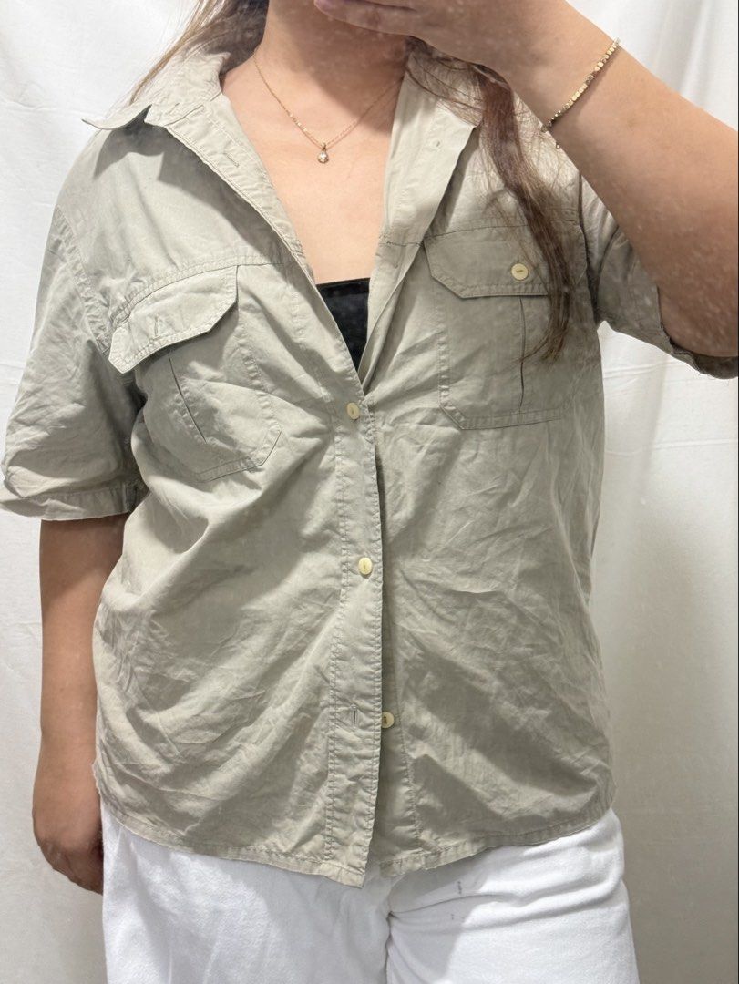 Beige Short Sleeve Button Up Shirt with Pockets (Category: Shirts) located in Manila. Submitted by halsea (Listing ID 1464699308, Image 2). Description: for baggy fit - med to large for normal fit - xl with issues in the sleeves but not noticeable when worn model: l-xl .