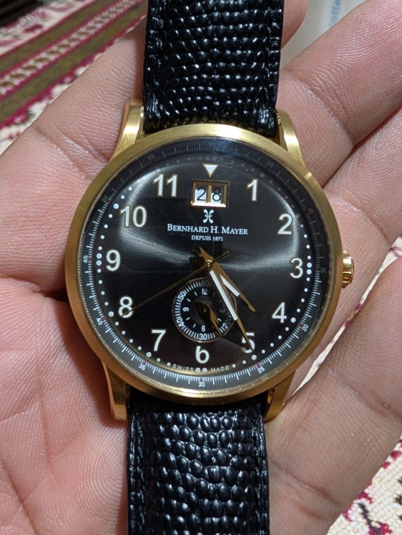 Bernhard Mayer Dual Time Men's Watch (Category: Men's Watches) located in Makati City. Submitted by greatbuysmnl (Listing ID 1464645013, Image 1). Description: Bernhard H. Mayer Men's Watch Dual Time Date Watch Quartz case 45 mm with crown Sapphire glass Swiss made Black genuine leather strap (Italy) in Excellent condition.