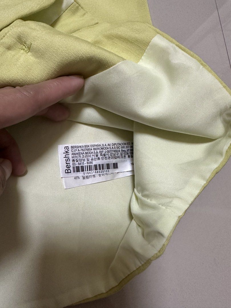 Bershka lime green vest top (Category: Sleeveless) located in Davao. Submitted by theresetshelf (Listing ID 1464644305, Image 3). Description: lime green cropped tailored vest V-neckline front botton bust size 36 Length 17 xs-small on tag.