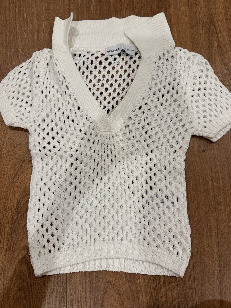 Berska white polo with holes (Category: Shirts) located in Paranaque City. Submitted by bbyooodaa (Listing ID 1464644552, Image 1). Description: Fashion statement polo top with holes.