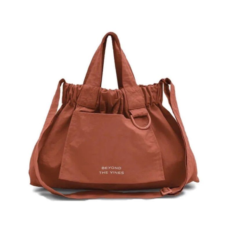Beyond The Vines XS Dumpling Bag (Category: Tote Bags) located in Muntinlupa City. Submitted by andsshop_ (Listing ID 1464588121, Image 2). Description: XS Dumpling Bag in Terracotta. Lightweight and durable. Used out only once. In excellent, brand new condition. ✨ Shipped from Singapore! SRP: 3,790.00 RFS: Don’t use it at all.