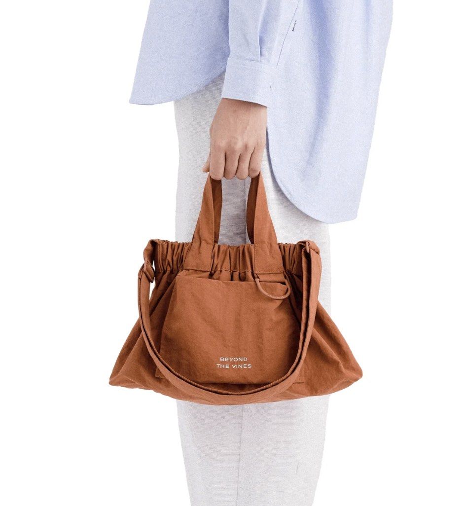 Beyond The Vines XS Dumpling Bag (Category: Tote Bags) located in Muntinlupa City. Submitted by andsshop_ (Listing ID 1464588121, Image 1). Description: XS Dumpling Bag in Terracotta. Lightweight and durable. Used out only once. In excellent, brand new condition. ✨ Shipped from Singapore! SRP: 3,790.00 RFS: Don’t use it at all.