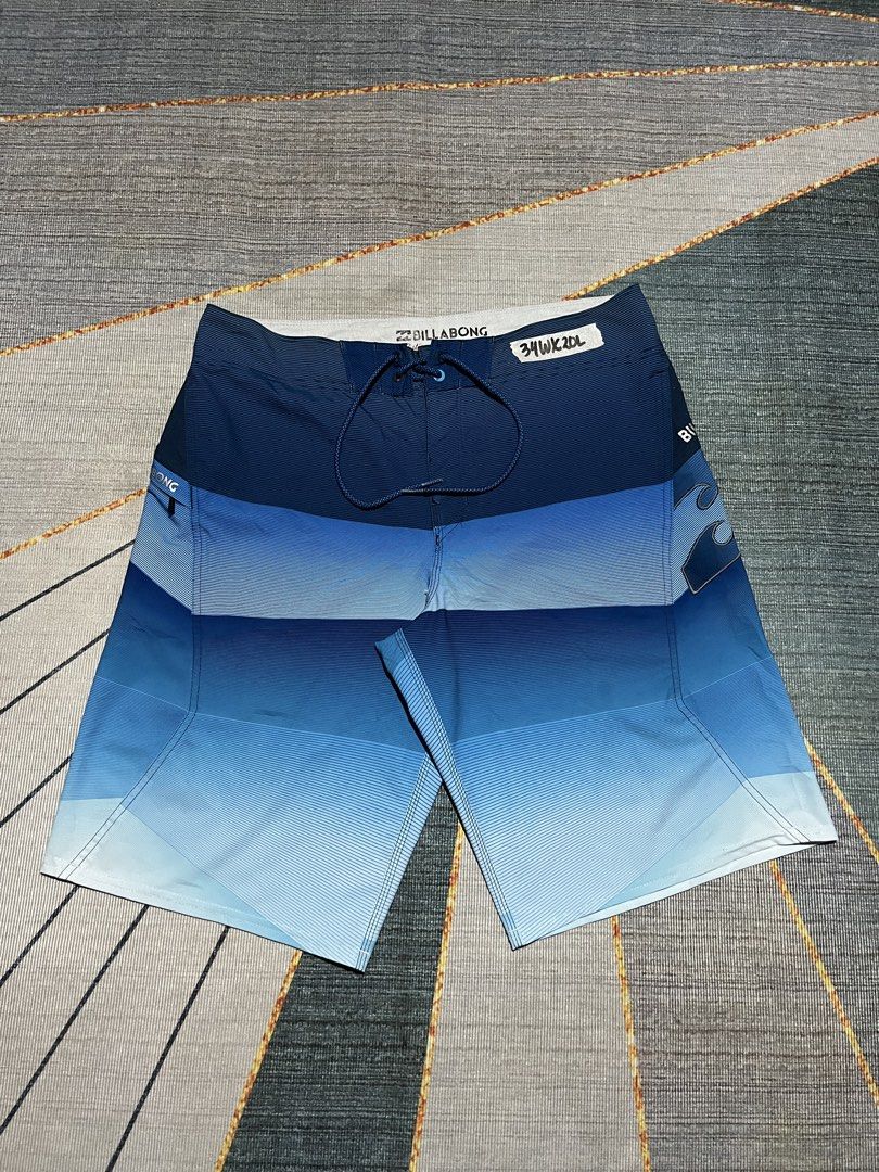 Billabong Board Shorts 34W 2DL Blue Gradient (Category: Swim Trunks & Board Shorts) located in Puerto Princesa. Submitted by dijaydj28 (Listing ID 1464589913, Image 2). Description: - Brand: Billabong - Size: 34 - Design: Cool blue gradient - Features: Drawstring waistband for a secure fit - Pocket: One back pocket - Ideal for: Swimming, surfing, and all water activities.