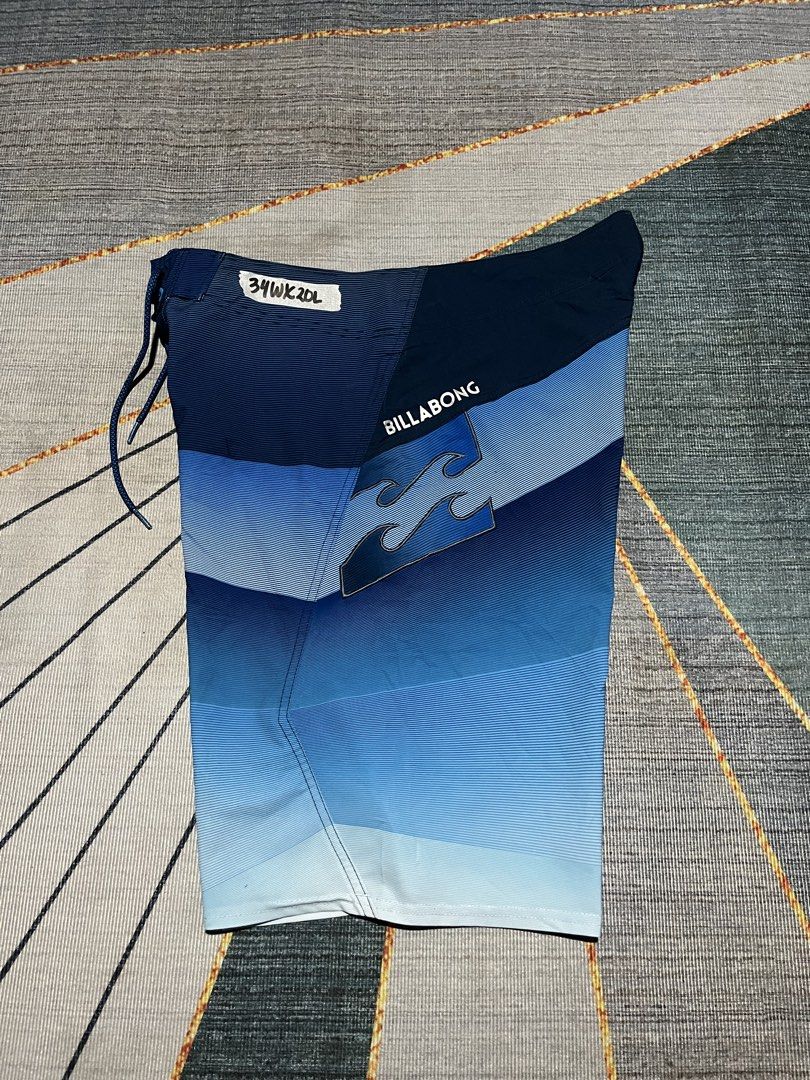Billabong Board Shorts 34W 2DL Blue Gradient (Category: Swim Trunks & Board Shorts) located in Puerto Princesa. Submitted by dijaydj28 (Listing ID 1464589913, Image 1). Description: - Brand: Billabong - Size: 34 - Design: Cool blue gradient - Features: Drawstring waistband for a secure fit - Pocket: One back pocket - Ideal for: Swimming, surfing, and all water activities.
