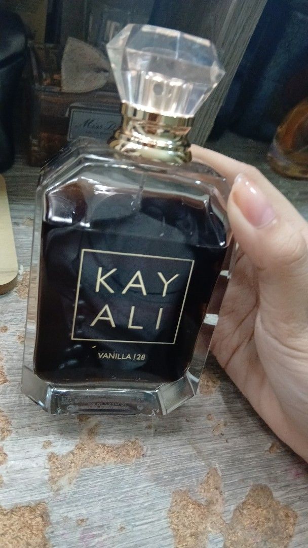 Billie Eilish Eau de Parfum & Kayali Vanilla 28 (Category: Fragrance & Deodorants) located in Manila. Submitted by xiaolongba0o (Listing ID 1464744740, Image 3). Description: - Items: Billie Eilish EDP (gold metallic bust) & Kayali Vanilla 28 EDP (glass bottle with diamond cap) - Scent Profile: Deep vanilla - Condition: Lots of juice left in both bottles - Options: Available as a bundle or individually - Perfect for: Any perfume collection enthus