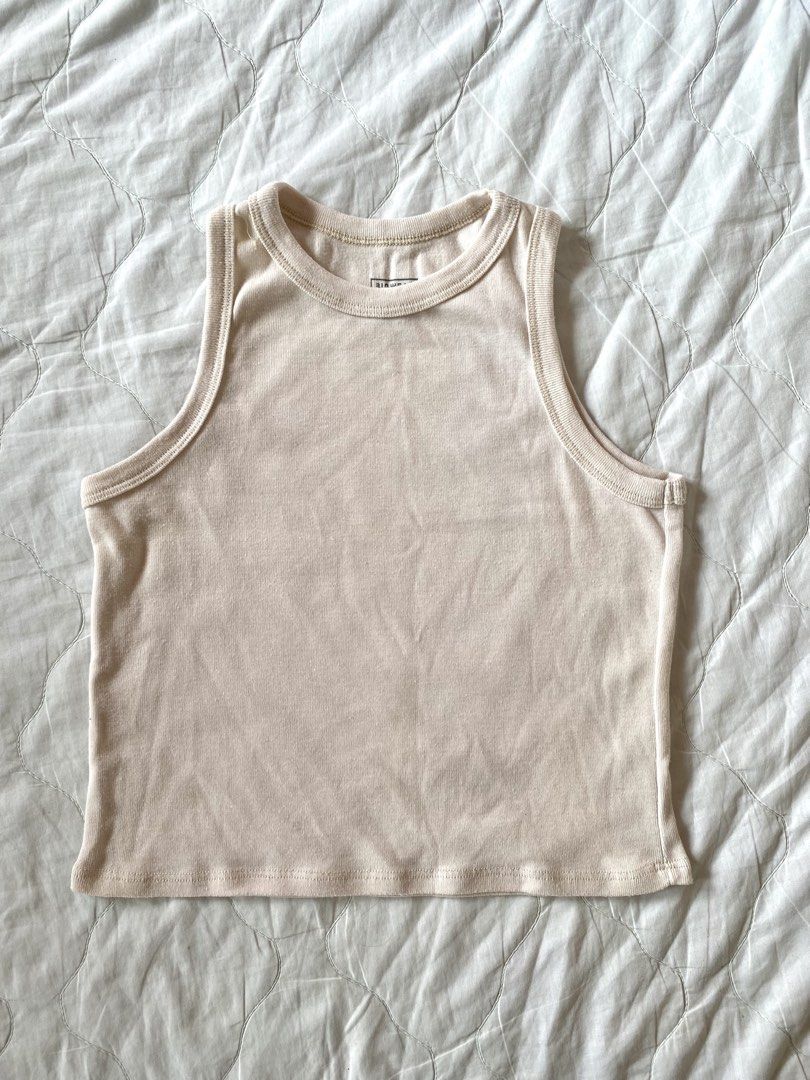 Biowear Beige Ribbed Tank Top (Category: Sleeveless) located in Quezon City. Submitted by viacb (Listing ID 1464670691, Image 1). Description: size xs-s mop: gcash mod: jnt/lalamove *location: quezon city.