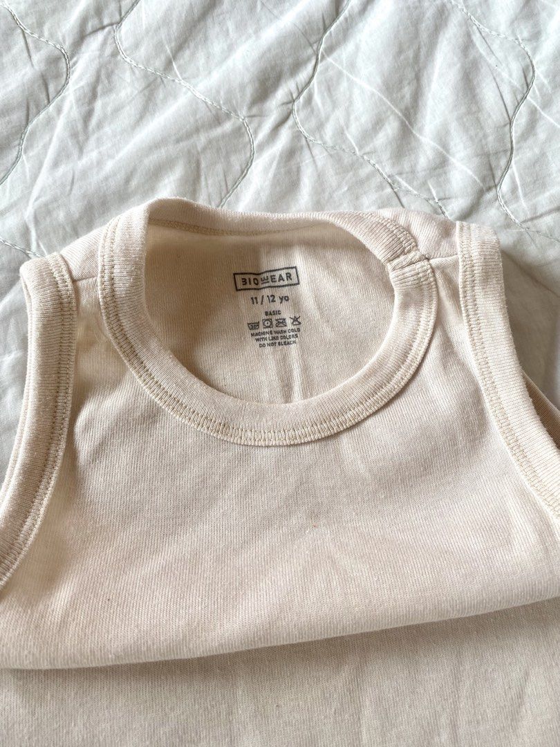 Biowear Beige Ribbed Tank Top (Category: Sleeveless) located in Quezon City. Submitted by viacb (Listing ID 1464670691, Image 3). Description: size xs-s mop: gcash mod: jnt/lalamove *location: quezon city.