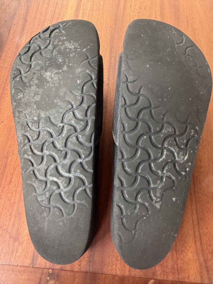 Birkenstock Black Rubber Slides Size 42 (Category: Slippers & Slides) located in Manila. Submitted by xenasales (Listing ID 1464603129, Image 2). Description: - Black Birkenstock slides - Rubber material - Size 40 - Soles show some wear - Perfect for casual wear or after sports - Easy to clean.