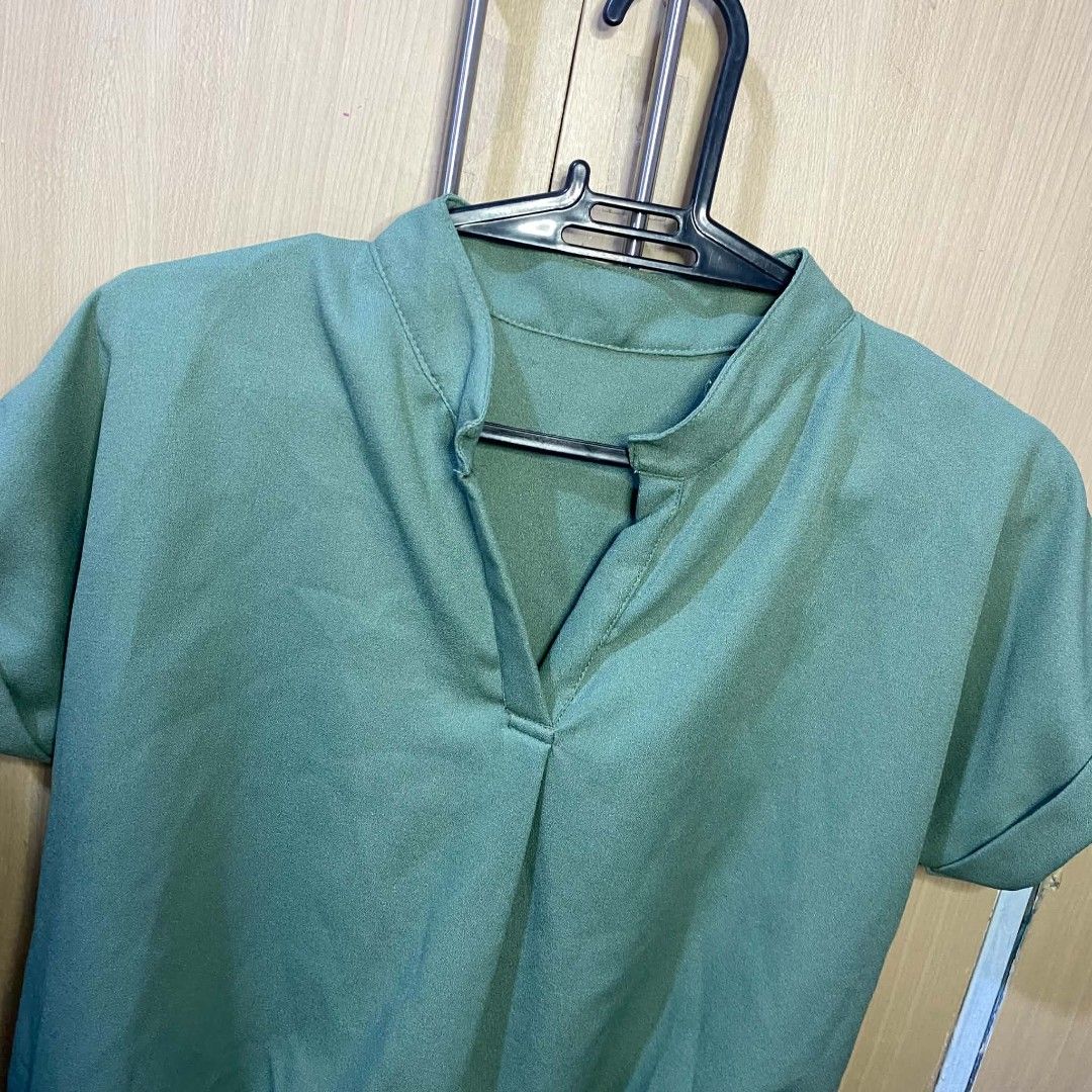 Bkk Blouse in Green (Category: Blouses) located in Las Pinas. Submitted by modemnl (Listing ID 1464733339, Image 2). Description: Size: Freesize (fits up to Large) | Color: Green Simple and versatile plain green blouse that’s perfect for everyday wear, casual outings, or dressed-up looks. -Lightweight and comfortable -Relaxed, easy-to-wear fit -Classic plain design -Easy to pair with jeans, trousers, or skirts.