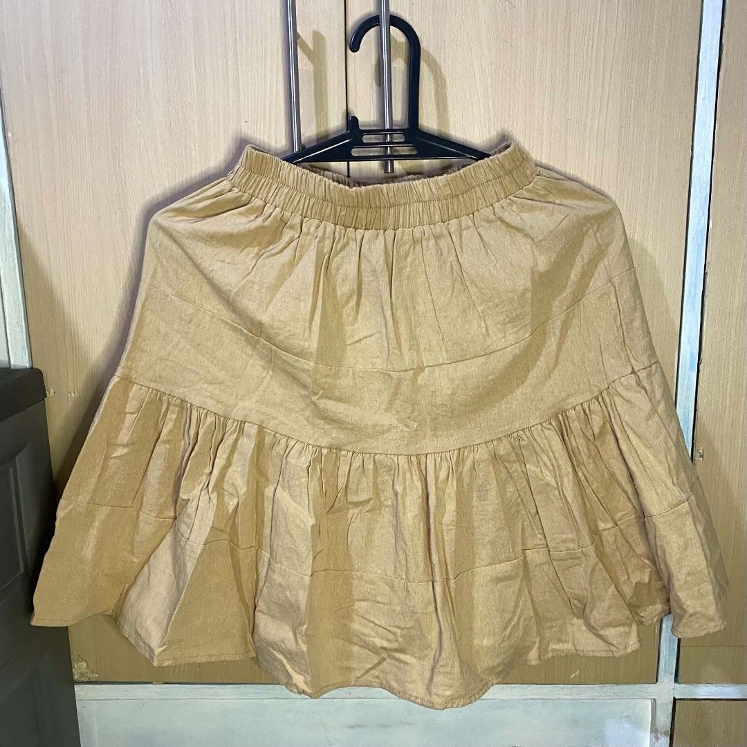 BKK Top and Skirt Set BN (Category: Sets or Coordinates) located in Las Pinas. Submitted by modemnl (Listing ID 1464740206, Image 3). Description: Size: Small-Medium Material: Linen Color: Brown Chic and feminine two-piece set featuring a sleeveless linen top paired with a cute ruffle skirt. Lightweight and comfortable, perfect for warm-weather days, vacations, brunch, or casual outings. -Linen fabric -Lightweight and comfortable -Easy to wear as