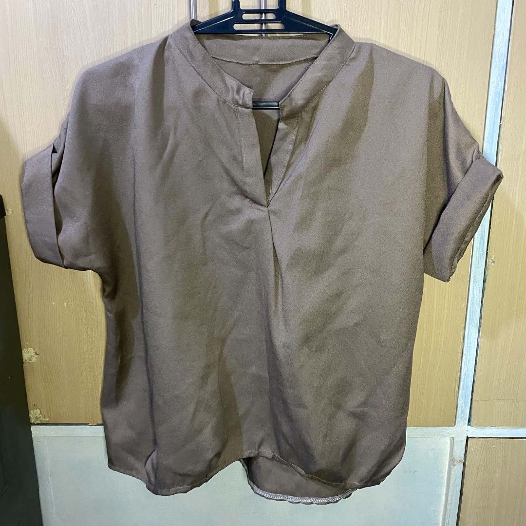 Bkk Top in Taupe (Category: Blouses) located in Las Pinas. Submitted by modemnl (Listing ID 1464733502, Image 1). Description: Size: Freesize (fits up to Large) | Color: Taupe Simple and versatile plain green blouse that’s perfect for everyday wear, casual outings, or dressed-up looks. -Lightweight and comfortable -Relaxed, easy-to-wear fit -Classic plain design -Easy to pair with jeans, trousers, or skirts.