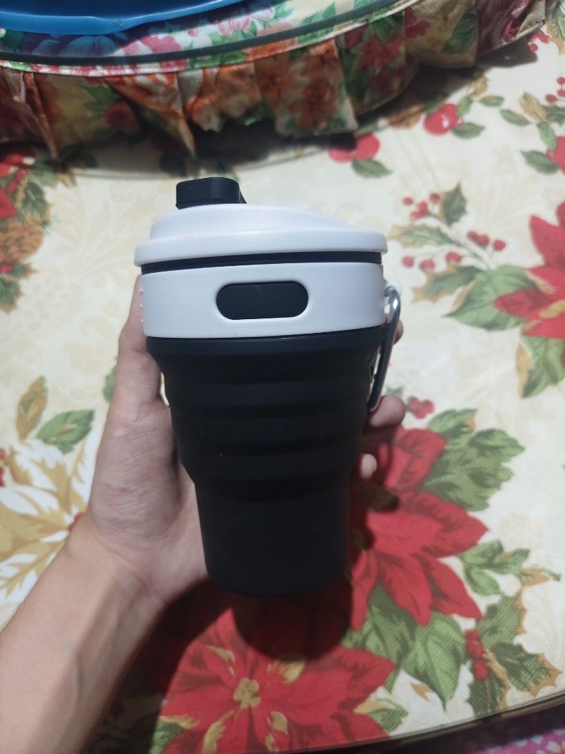 black 12 oz collapsible silicone travel cup (Category: Water Bottles & Tumblers) located in Bulacan. Submitted by angel.decluttersx (Listing ID 1464733405, Image 1). Description: 355 ml / 12 oz never been used pa.