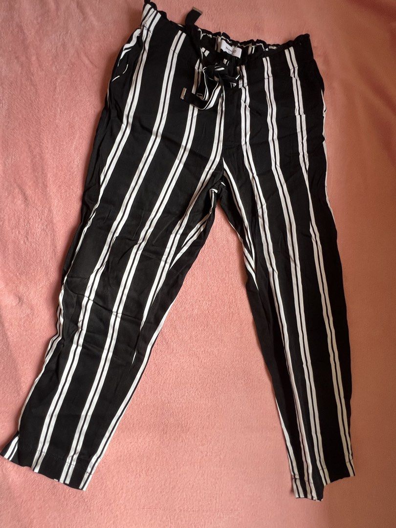 Black & White Striped High Waisted Pants (Category: Jeans) located in Batangas. Submitted by alaisaampa7513 (Listing ID 1464570715, Image 1). Description: - Mango Basics black and white striped pants - High-waisted design - Adjustable drawstring tie - Comfortable elasticated waistband - Cropped leg length - Perfect for versatile styling (casual to dressy) - A wardrobe essential.