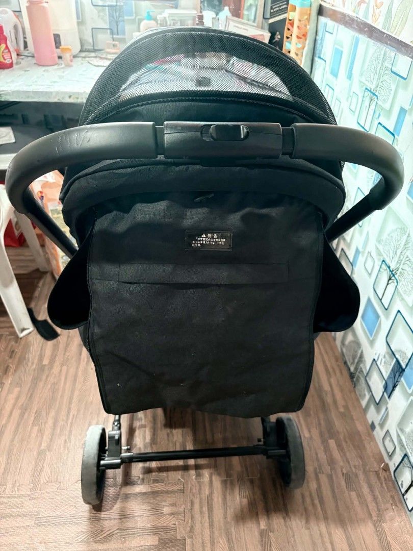 Black Baby Stroller (Category: Strollers) located in Davao. Submitted by dessamiho25 (Listing ID 1464616425, Image 3). Description: - Lightweight and easy to maneuver black baby stroller - Canopy provides ample shade for your little one - Convenient storage basket underneath for essentials - Folds compactly for easy storage and travel - Perfect for daily walks and on-the-go adventures - Ready for a new loving home!.