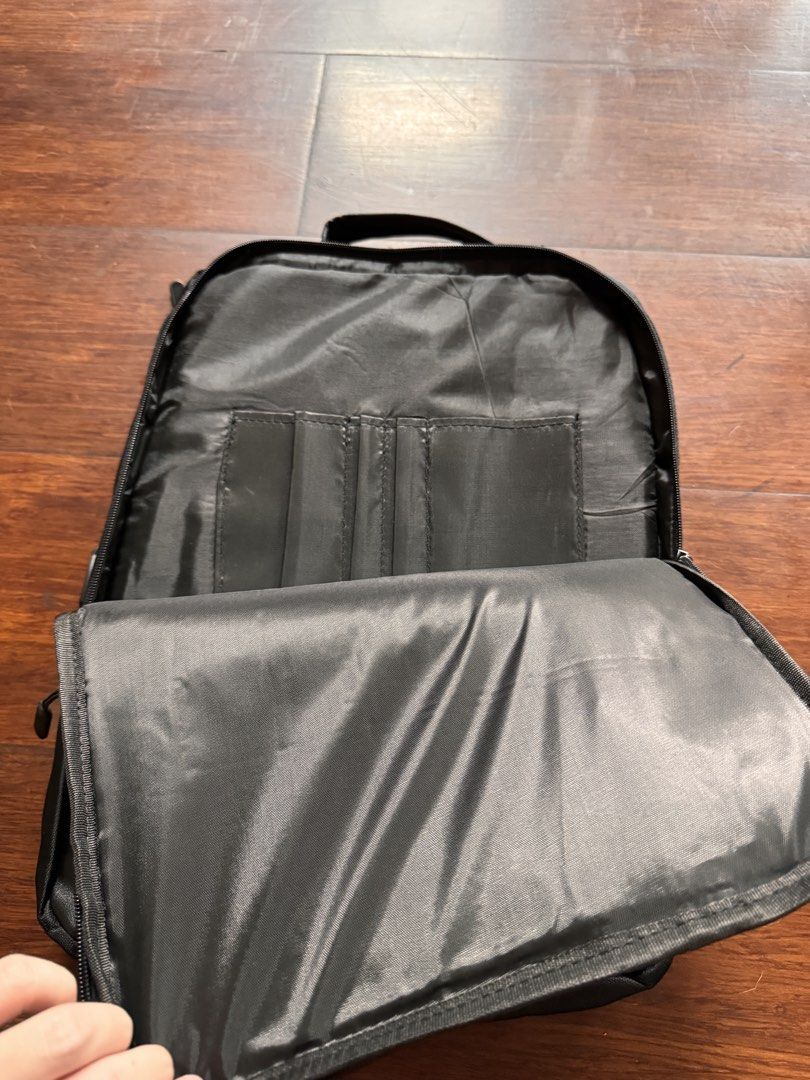Black Backpack with USB Charging Port (Category: Backpacks) located in Quezon City. Submitted by wilstockpile (Listing ID 1464579611, Image 3). Description: - Stylish black backpack - Convenient side USB charging port - Comfortable padded shoulder straps - Multiple compartments for organization - Spacious interior for all your essentials - Smooth-gliding zippers - Ideal for school, work, or travel - Ready for its new owner!.