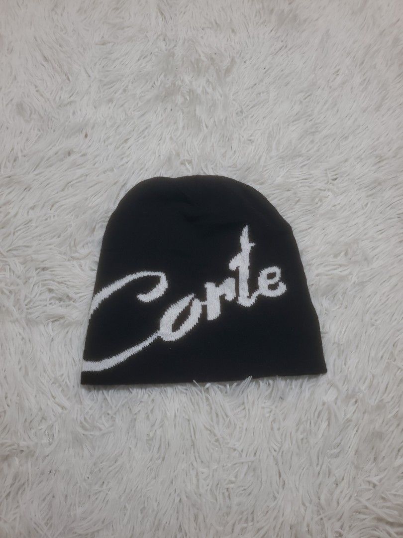 Black Beanie with White 'Conte' Logo (Category: Caps & Hats) located in Manila. Submitted by royalrabbit.7b2a11 (Listing ID 1464627637, Image 2). Description: - Classic black knit beanie - White 'Conte' logo across the front - Simple and timeless design - Excellent for keeping warm - Fits most adult head sizes - Ideal for everyday casual wear.