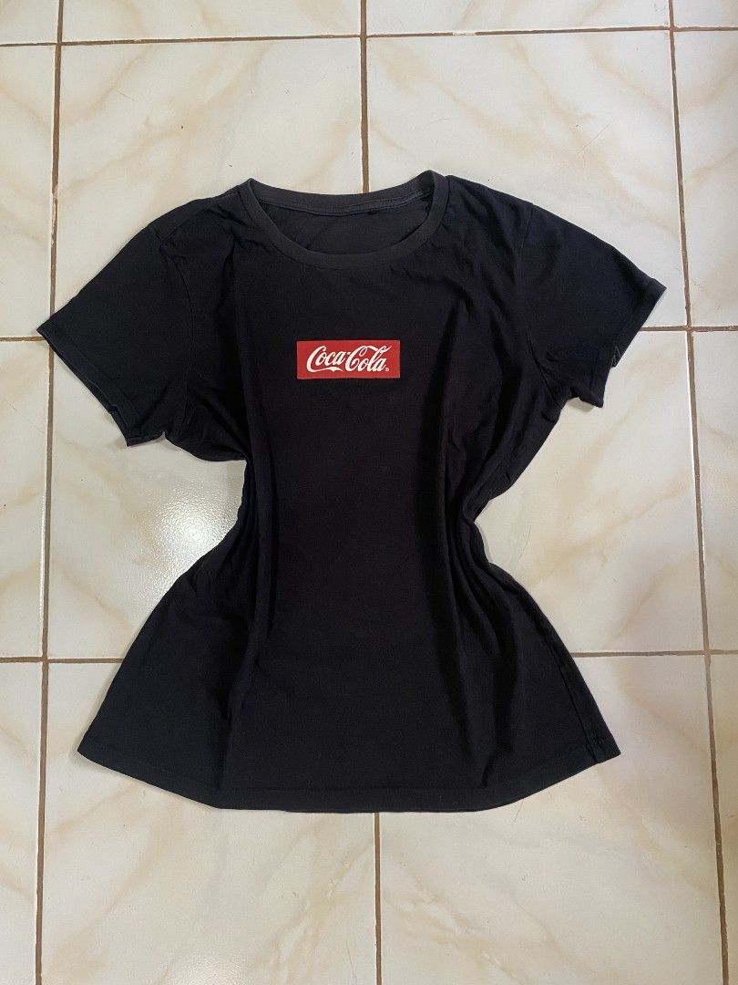 Black Coca-Cola T-shirt Size L (Category: Shirts) located in Roxas City. Submitted by xyddvs (Listing ID 1464602627, Image 1). Description: W 20 L 24.