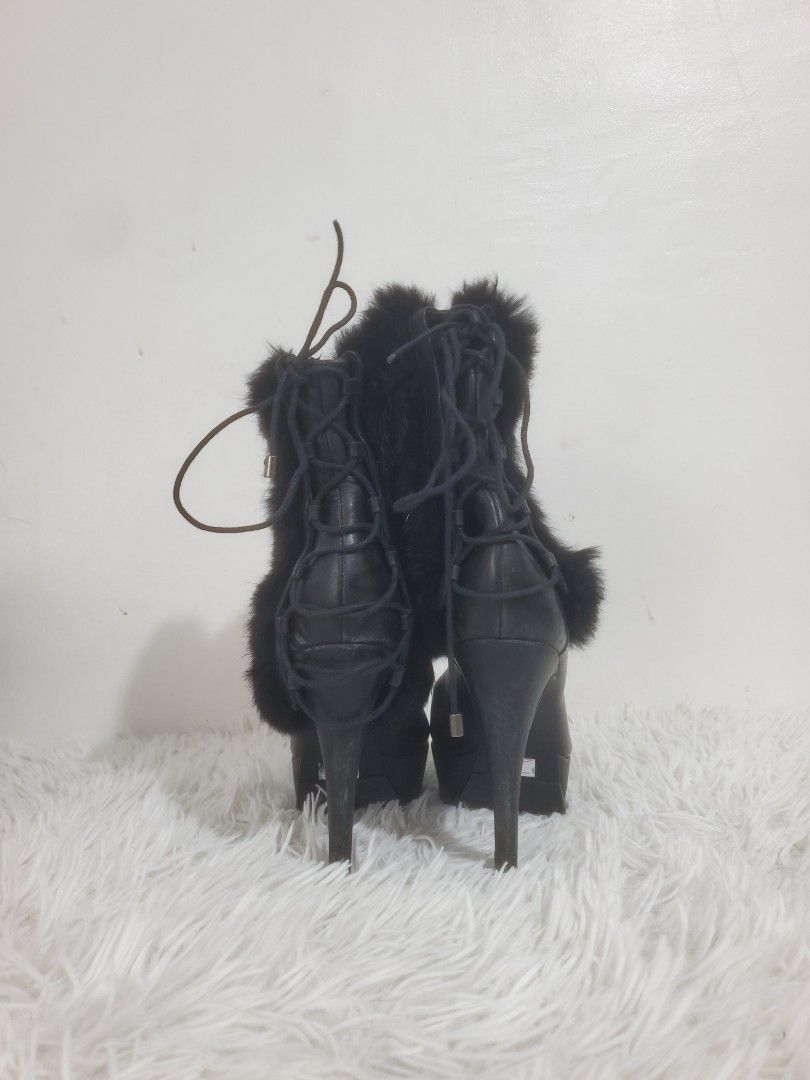 Black Fur Lace-Up Platform High Heel Boots (Category: Boots) located in Manila. Submitted by royalrabbit.7b2a11 (Listing ID 1464628733, Image 2). Description: - Black platform boots - Fur trim detail - Lace-up front closure - Chunky heel and platform sole - Size: 35 EU - Ideal for night outs or adding an edgy vibe to your style.