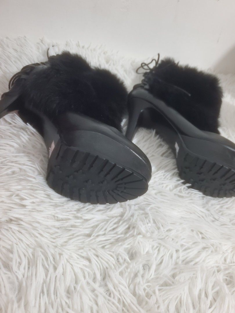 Black Fur Lace-Up Platform High Heel Boots (Category: Boots) located in Manila. Submitted by royalrabbit.7b2a11 (Listing ID 1464628733, Image 1). Description: - Black platform boots - Fur trim detail - Lace-up front closure - Chunky heel and platform sole - Size: 35 EU - Ideal for night outs or adding an edgy vibe to your style.