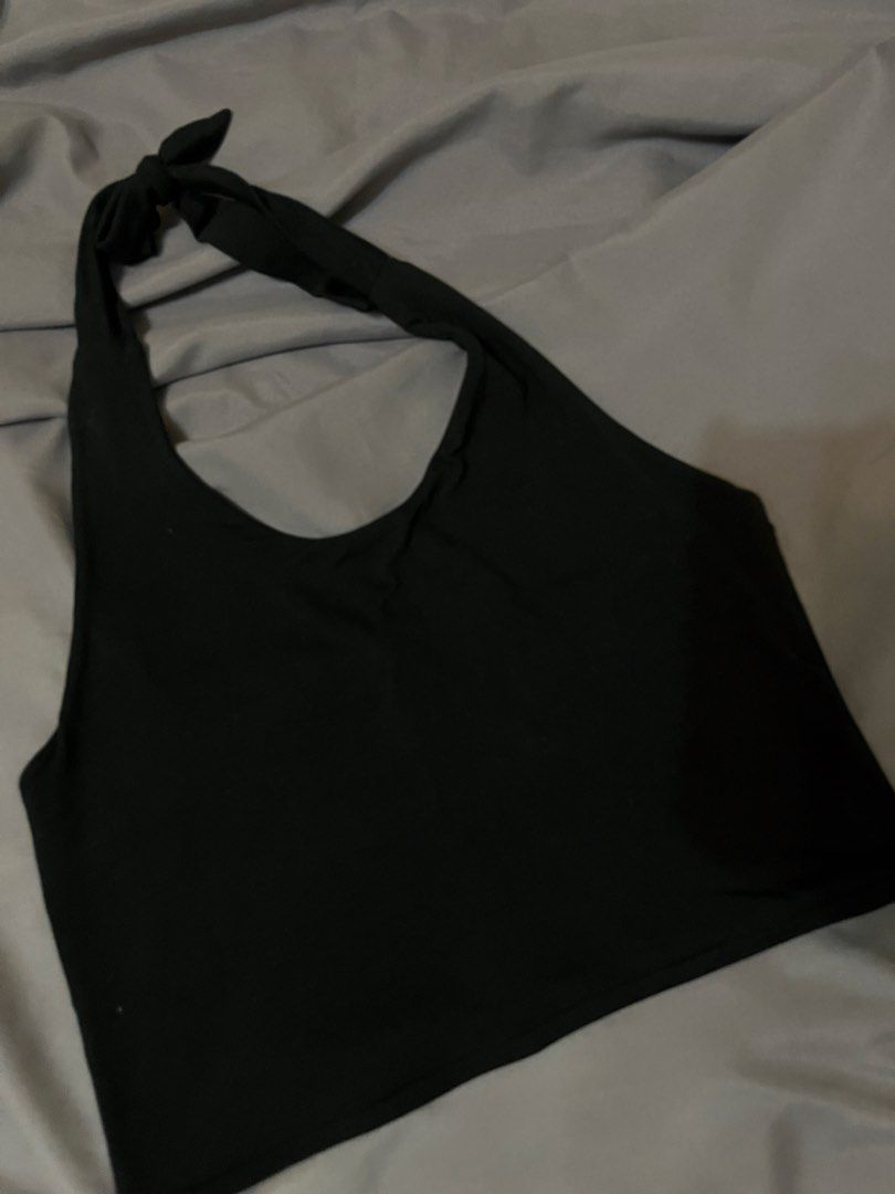 Black Halter and High Neck Crop Tops Bundle (Category: Sleeveless) located in Taguig. Submitted by lovestoreph (Listing ID 1464714332, Image 3). Description: - Bundle deal: 2 essential black crop tops for the price of one! - Top 1: Classic high mock neck, sleeveless design - Top 2: Chic halter neck with adjustable back tie straps - Material: Super soft, breathable, and stretchy jersey fabric - Styling: Solid black color, perfect for layering or s