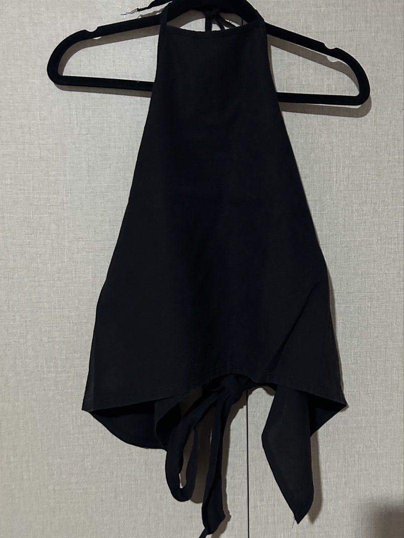 Black Halter-Backless Top with Tie Back (Category: Sleeveless) located in Pasig City. Submitted by winwinderland (Listing ID 1464620567, Image 1). Description: Black Halter-Backless Top with Tie Back — ₱80 + SF ✱ Small ✱ used only 2 times ✱ black colorway ✱ in good condition ✱ tie closure ✱ bought from Tiktok Shop.