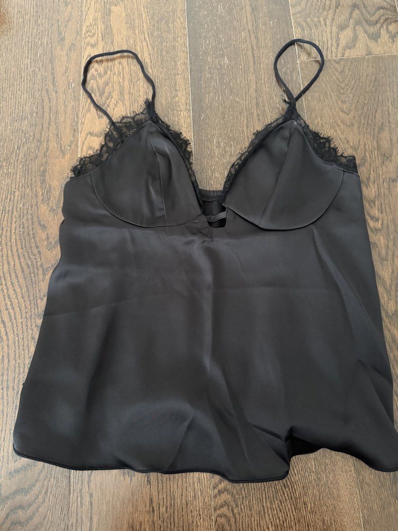 Black lace trim satin cami top (Category: Sleeveless) located in Manila. Submitted by shopmnl.studio (Listing ID 1464624403, Image 1). Description: Size: S-M.