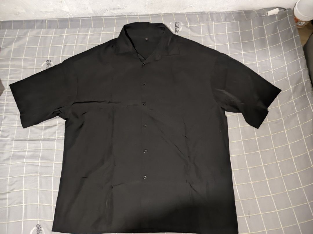 BLACK POLO SHIRT (Category: Tshirts & Polo Shirts ) located in Catarman. Submitted by closet.connect (Listing ID 1464734100, Image 1). Description: The item is too big for the user, but still works just fine specially for oversize lovers.