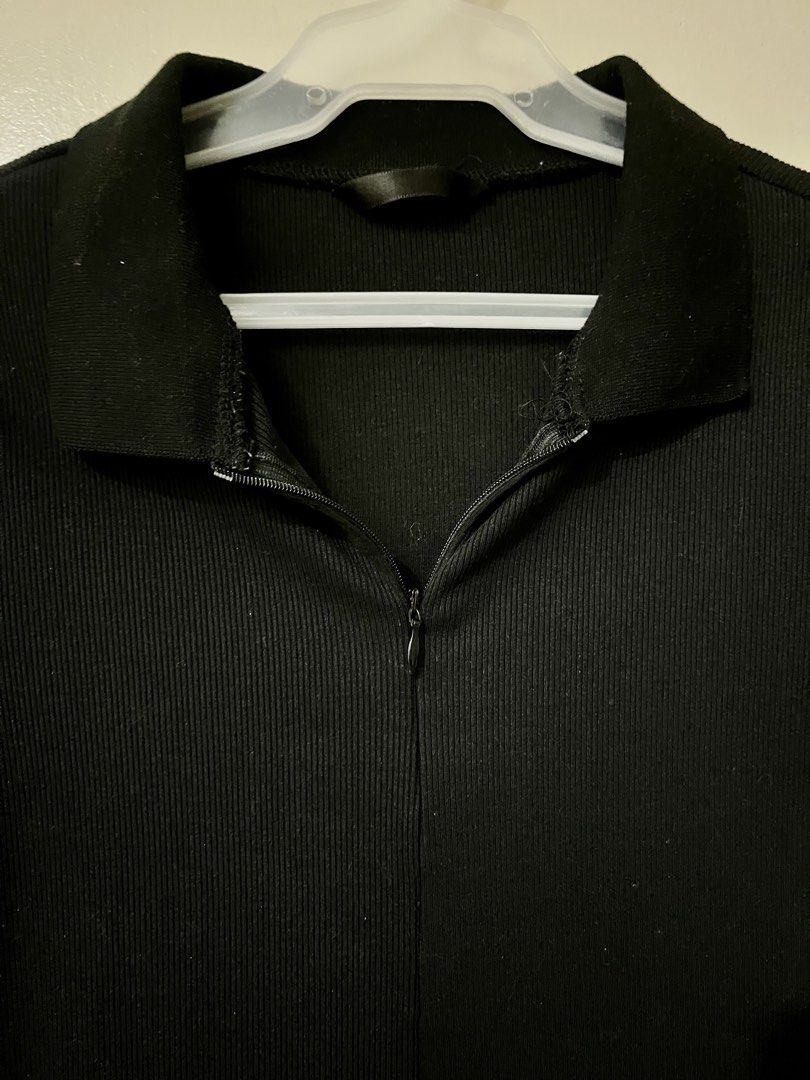 Black Ribbed Collar Zip Front Romper (Category: Rompers) located in Manila. Submitted by outtacloset (Listing ID 1464713468, Image 2). Description: - Color: Black - Style: Ribbed knit romper with built-in shorts and form-fitting silhouette - Features: Short sleeves, stylish collared neckline, and adjustable front zipper closure - Comfort: Super stretchy and comfortable fabric - Best for: Casual outings, daily errands, or effortless everyday styli