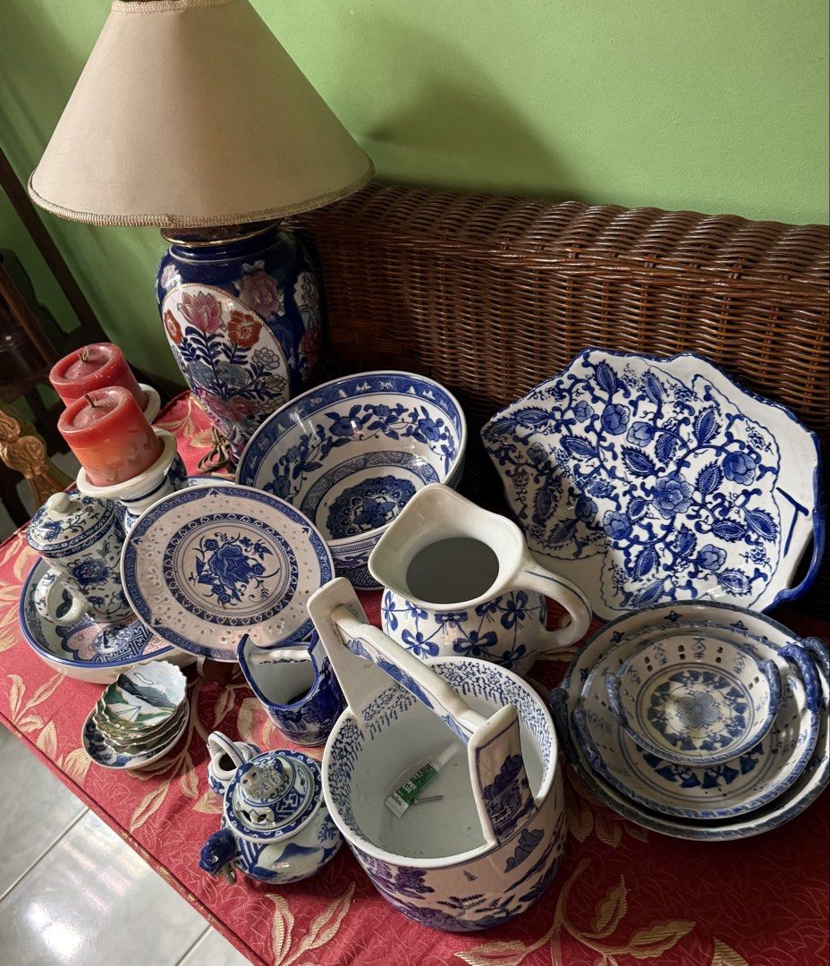 Blue and White Porcelain (Category: Other Home Decor) located in Bacoor. Submitted by mandy1865 (Listing ID 1464594817, Image 1). Description: - Collection of blue and white porcelain pieces. - Includes: large serving platter, bowls, pitcher, teapot, and smaller dishes. - Features intricate floral patterns on some pieces. - Perfect for display or everyday use. - Selling as a complete lot..