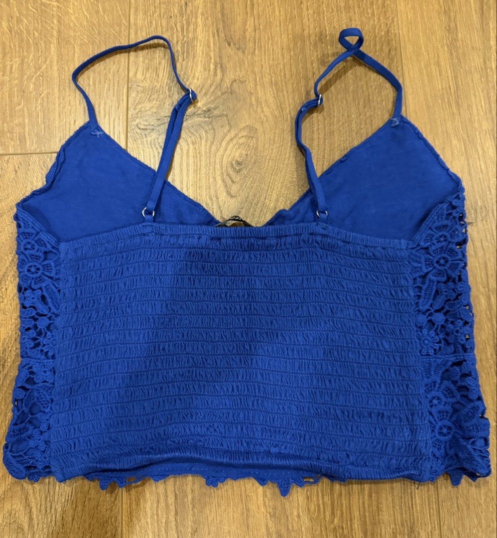 Blue Lace Floral Bralette (Category: Sleeveless) located in Paranaque City. Submitted by bbyooodaa (Listing ID 1464638142, Image 2). Description: Cute bright blue lacy bralette, cropped.