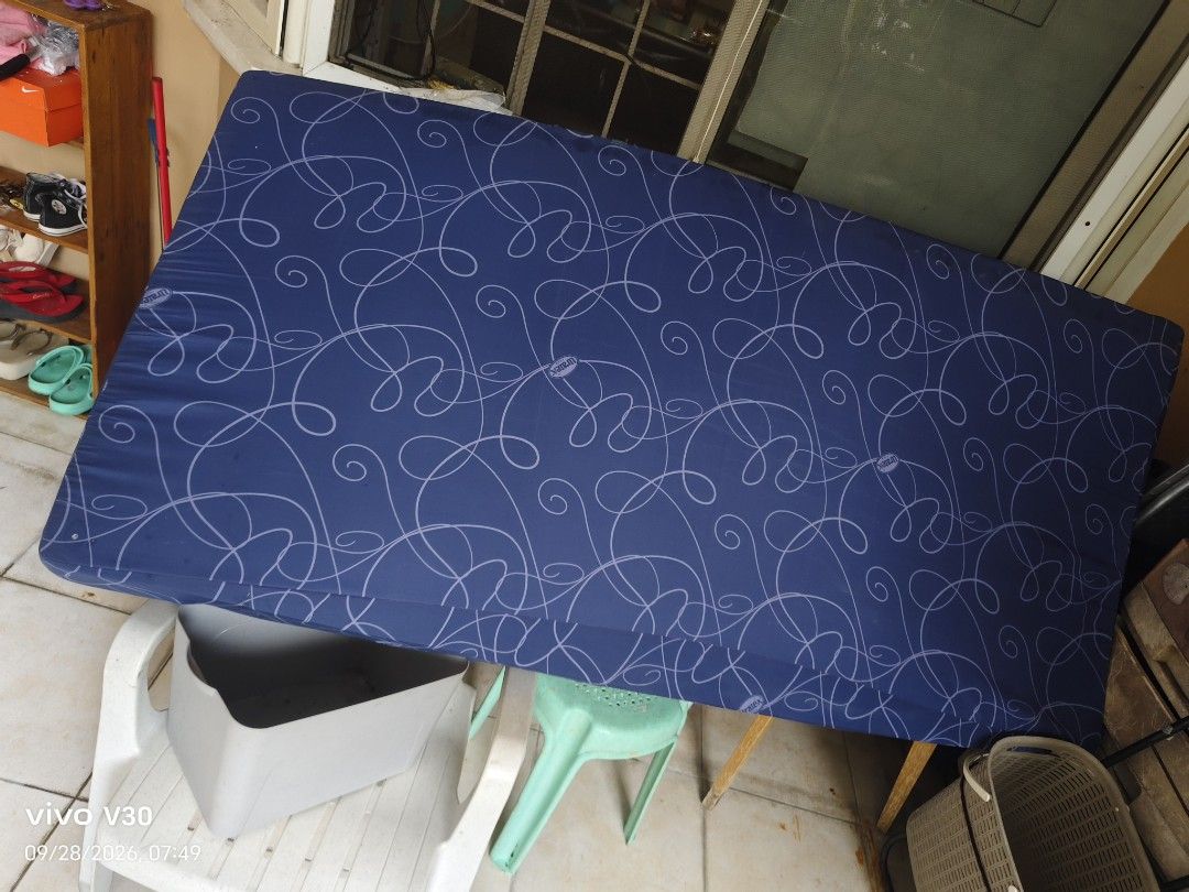 Blue Mattress Protector with Swirl Pattern (Category: Bedding & Towels) located in Caloocan City. Submitted by mae_bert (Listing ID 1464580028, Image 1). Description: - Blue mattress protector with a stylish white swirl pattern. - Designed to fit a single bed. - Effectively protects your mattress from spills and stains. - Simple to put on and remove for easy cleaning. - Ideal for maintaining a clean and fresh sleeping environment. - Reason for se