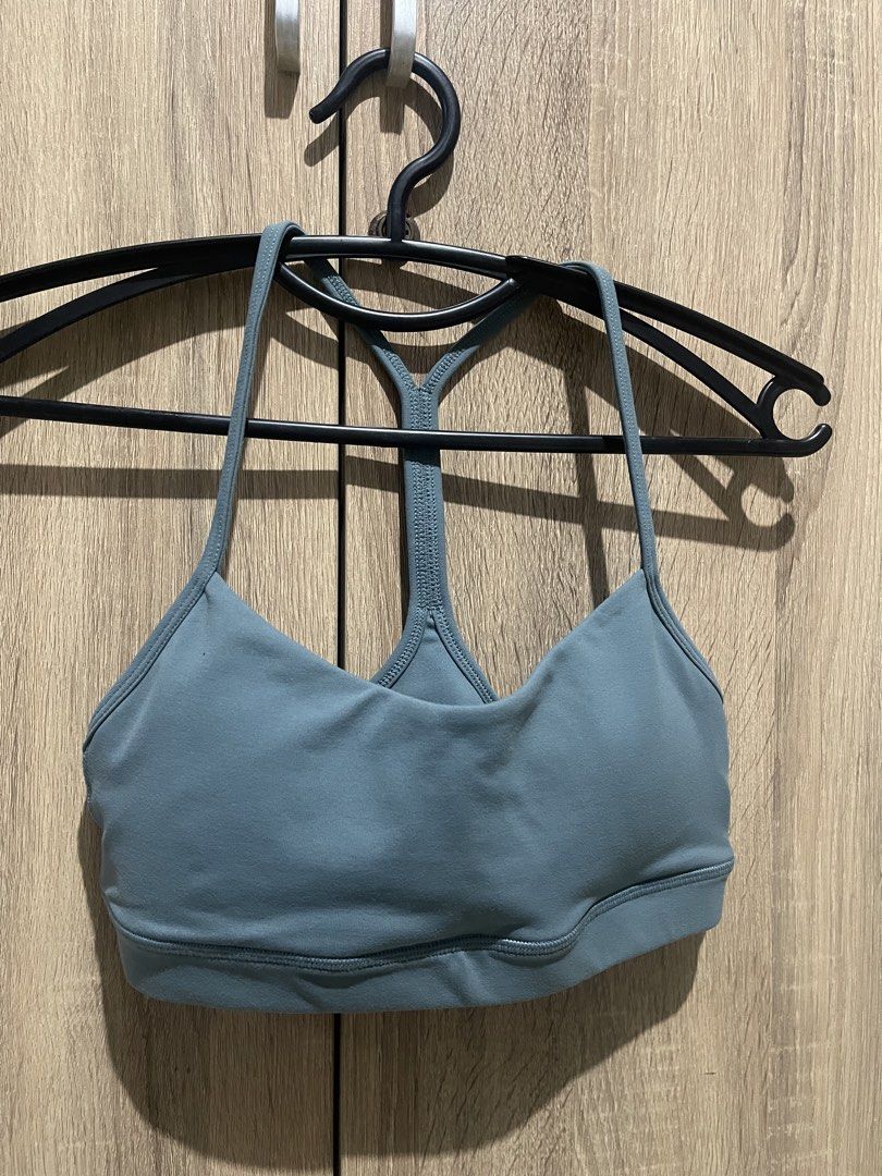 Blue Racerback Sports Bra (Category: Activewear) located in Manila. Submitted by preloveditems_jem (Listing ID 1464662711, Image 3). Description: Blue sports bra with a racerback design. Made from a nylon and spandex blend. Comfortable for workouts or everyday wear. With removable padding. Check photos for details..