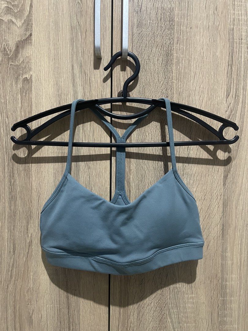Blue Racerback Sports Bra (Category: Activewear) located in Manila. Submitted by preloveditems_jem (Listing ID 1464662711, Image 1). Description: Blue sports bra with a racerback design. Made from a nylon and spandex blend. Comfortable for workouts or everyday wear. With removable padding. Check photos for details..
