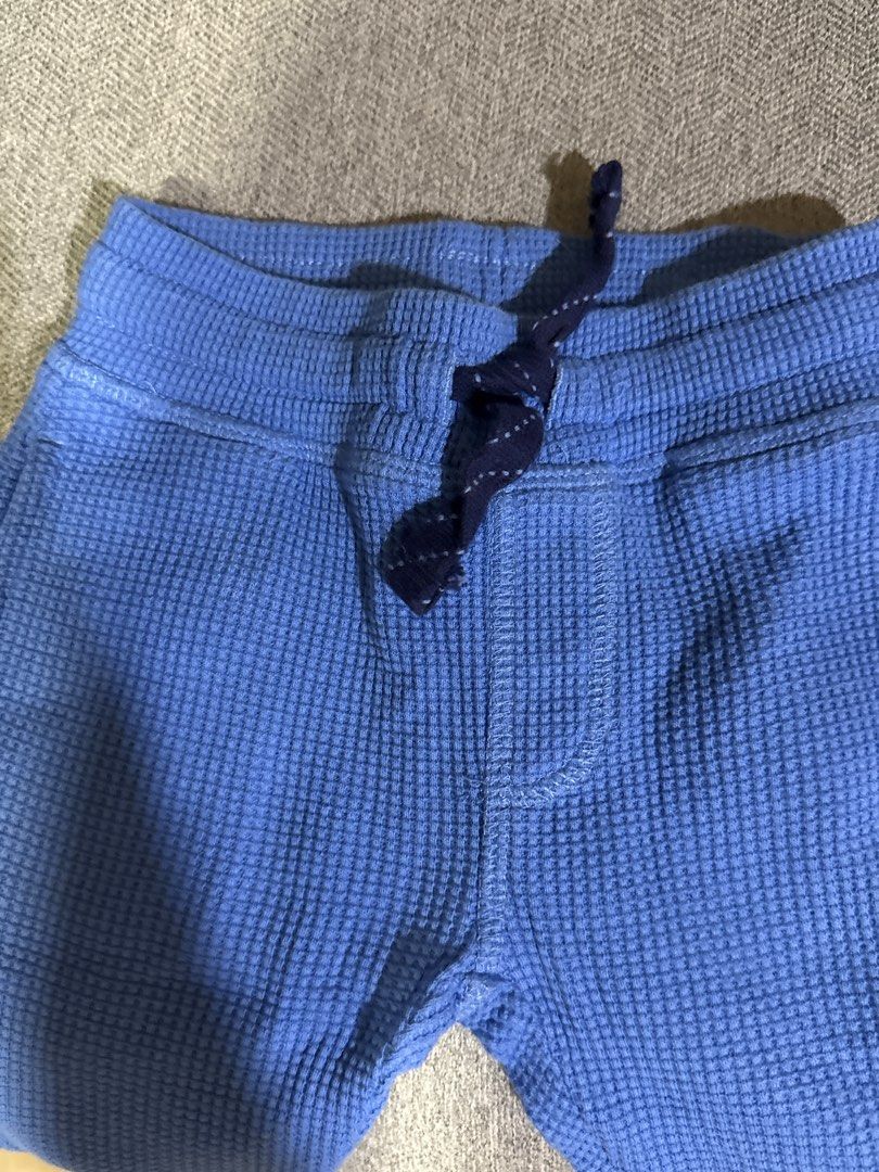 Blue Waffle Knit Jogger Pants with Drawstring (Category: Babies & Kids Fashion) located in Cebu City. Submitted by jillianmariebascones (Listing ID 1464694394, Image 2). Description: - Color & Material: Blue soft textured waffle knit cotton - Waistband: Elastic with dark blue adjustable drawstring - Comfort Features: Ribbed ankle cuffs to keep drafts out - Pockets: Convenient front pockets on both sides - Design: Plain back design, great for newb