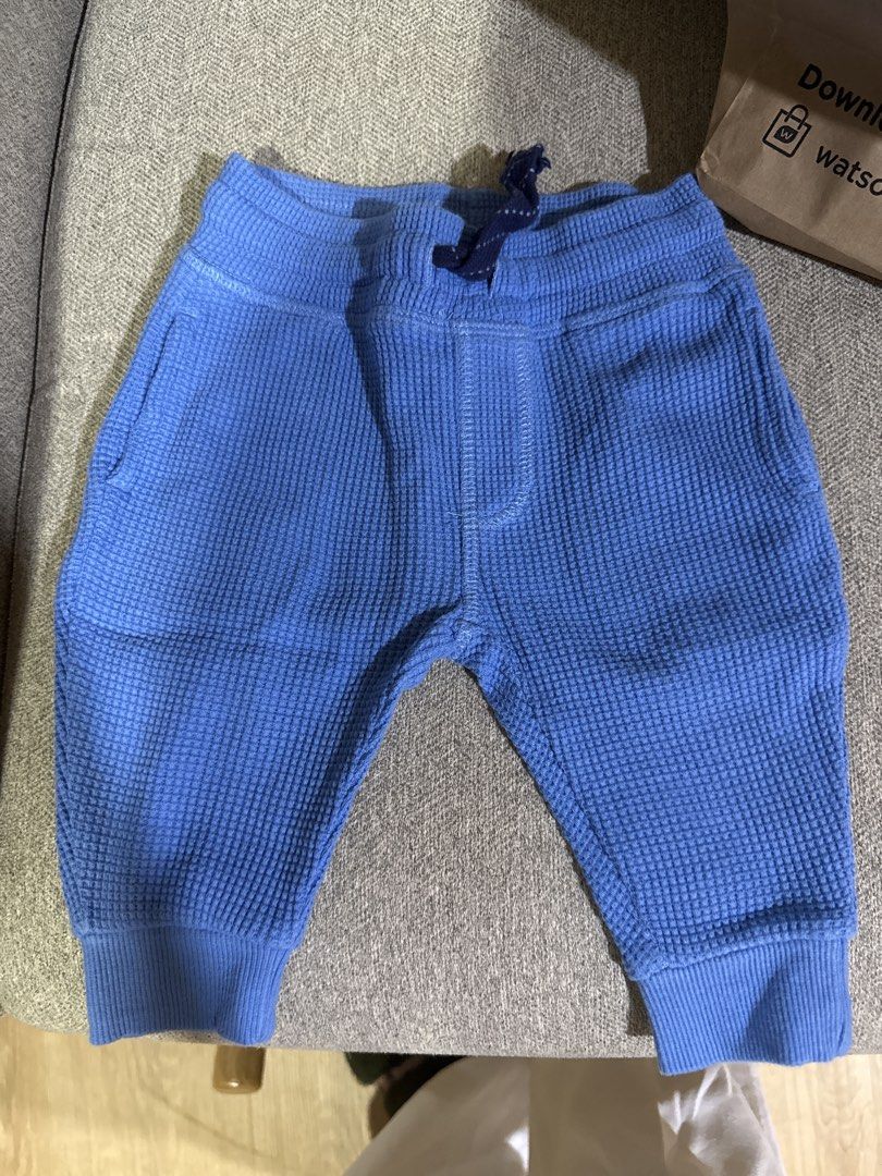 Blue Waffle Knit Jogger Pants with Drawstring (Category: Babies & Kids Fashion) located in Cebu City. Submitted by jillianmariebascones (Listing ID 1464694394, Image 1). Description: - Color & Material: Blue soft textured waffle knit cotton - Waistband: Elastic with dark blue adjustable drawstring - Comfort Features: Ribbed ankle cuffs to keep drafts out - Pockets: Convenient front pockets on both sides - Design: Plain back design, great for newb