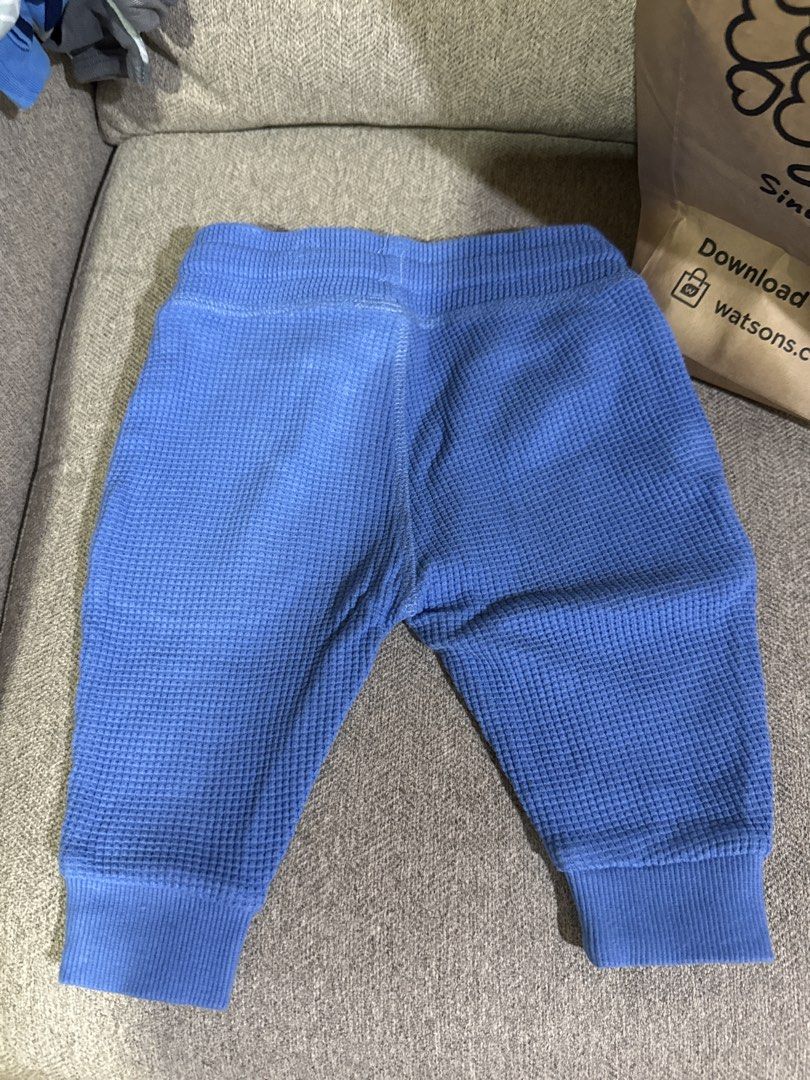 Blue Waffle Knit Jogger Pants with Drawstring (Category: Babies & Kids Fashion) located in Cebu City. Submitted by jillianmariebascones (Listing ID 1464694394, Image 3). Description: - Color & Material: Blue soft textured waffle knit cotton - Waistband: Elastic with dark blue adjustable drawstring - Comfort Features: Ribbed ankle cuffs to keep drafts out - Pockets: Convenient front pockets on both sides - Design: Plain back design, great for newb