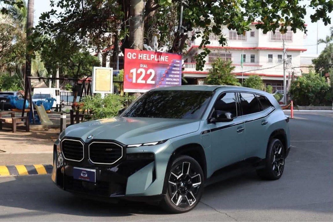 BMW XM Performance Auto (Category: Used Cars) located in Manila. Submitted by quality_cars (Listing ID 1464648936, Image 3). Description: 2024 BMW XM Performance 4.4L Twin Turbo V8 Engine Plug In Hybrid (PHEV) S68 644HP Flagship Model of BMW Cape York Green Exterior Blue Interior 12K Original Milage Only Cash Paid (with invoice from RSA) Casa Maintained 6 Ending Plate (No Coding) Registered 2027 Comes with Matte Paint Protection Film PPF Price: 9
