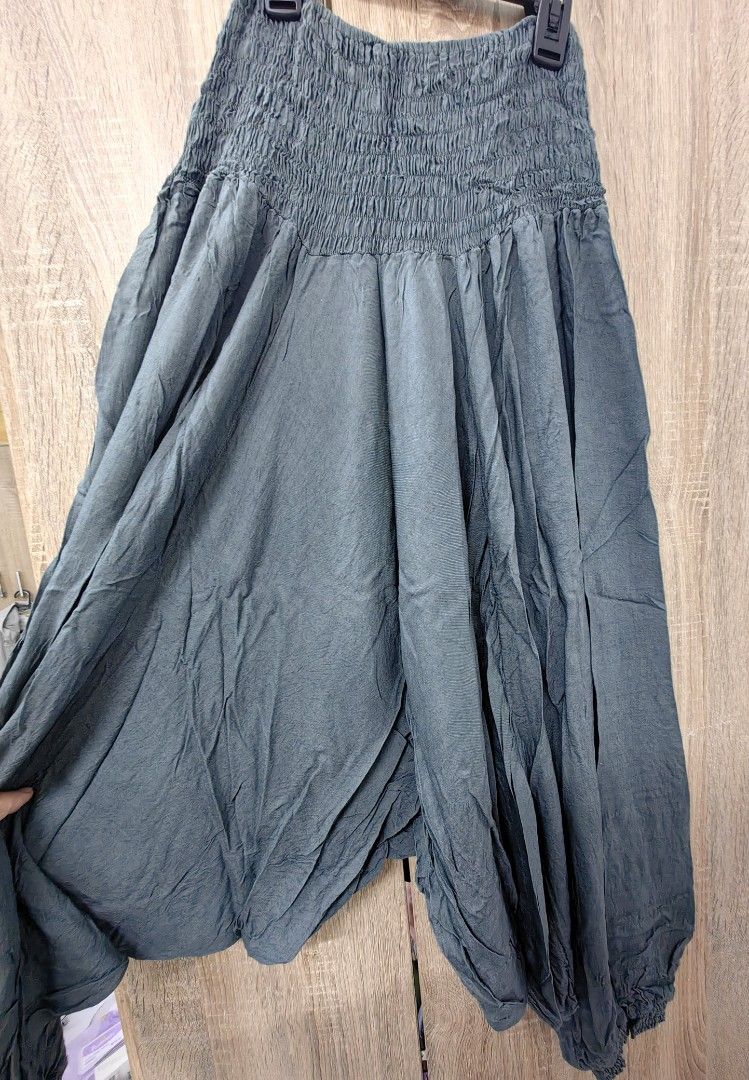 Boho Harem Pants Smocked Waist - Dark Grey (Category: Jeans) located in Las Pinas. Submitted by offtonewhome (Listing ID 1464611948, Image 2). Description: - Comfy harem pants - Stretchy smocked waist - Lightweight and flowy fabric - Unique baggy style with cinched ankles - Dark grey color - Made from 100% rayon - Ideal for lounging or casual wear - Fits up to medium body frame.