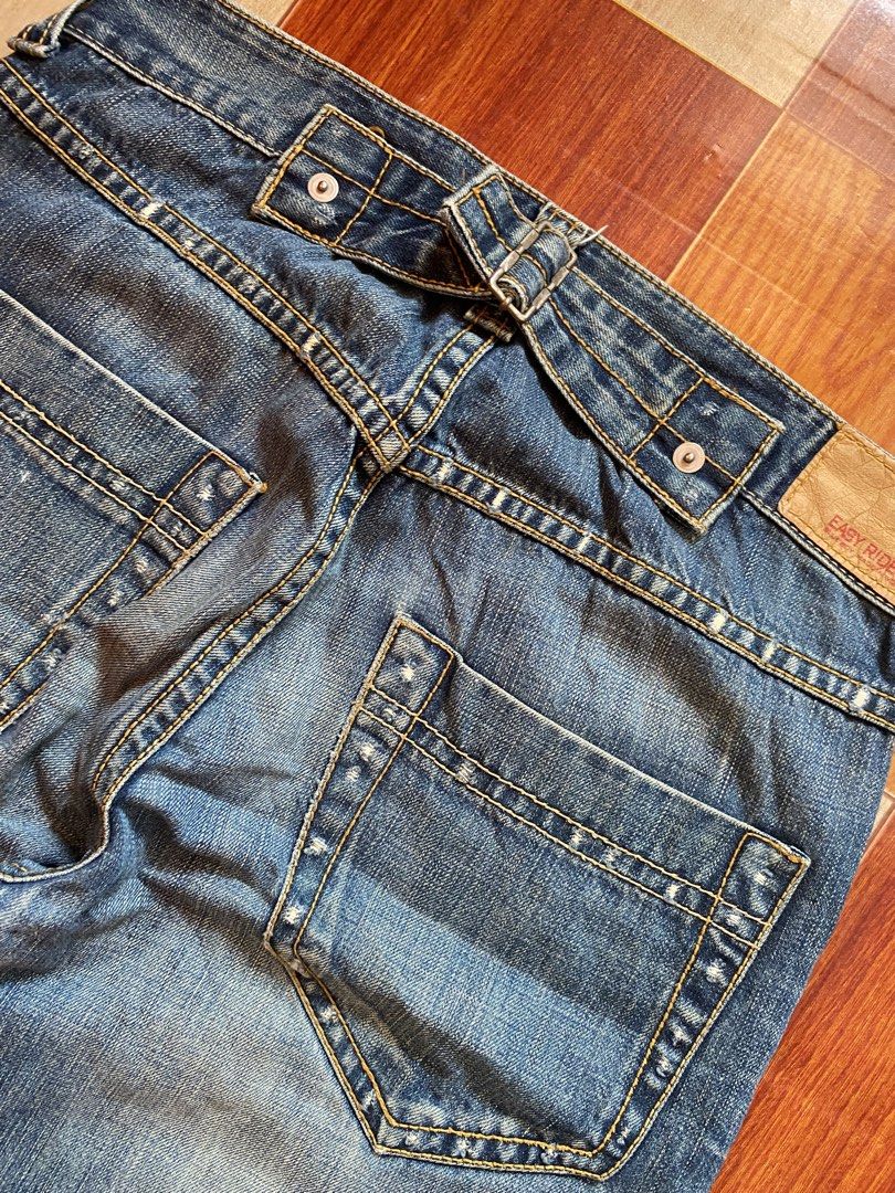 Mens Bootcut Jean (Category: Jeans) located in General Santos City (Dadiangas). Submitted by paellwq (Listing ID 1464577325, Image 3). Description: Easy Riders - Regular Bootcut Jeans w Buckle Waist : 34 inches Length: 43 inches Thigh : 13 inches Hem : 10 inches Good Condition- Nine out of ten Color Rate -Featuring Buckle On the Back -Good Scratches Design on Front Area -Need Wash! + Shipping Fee.