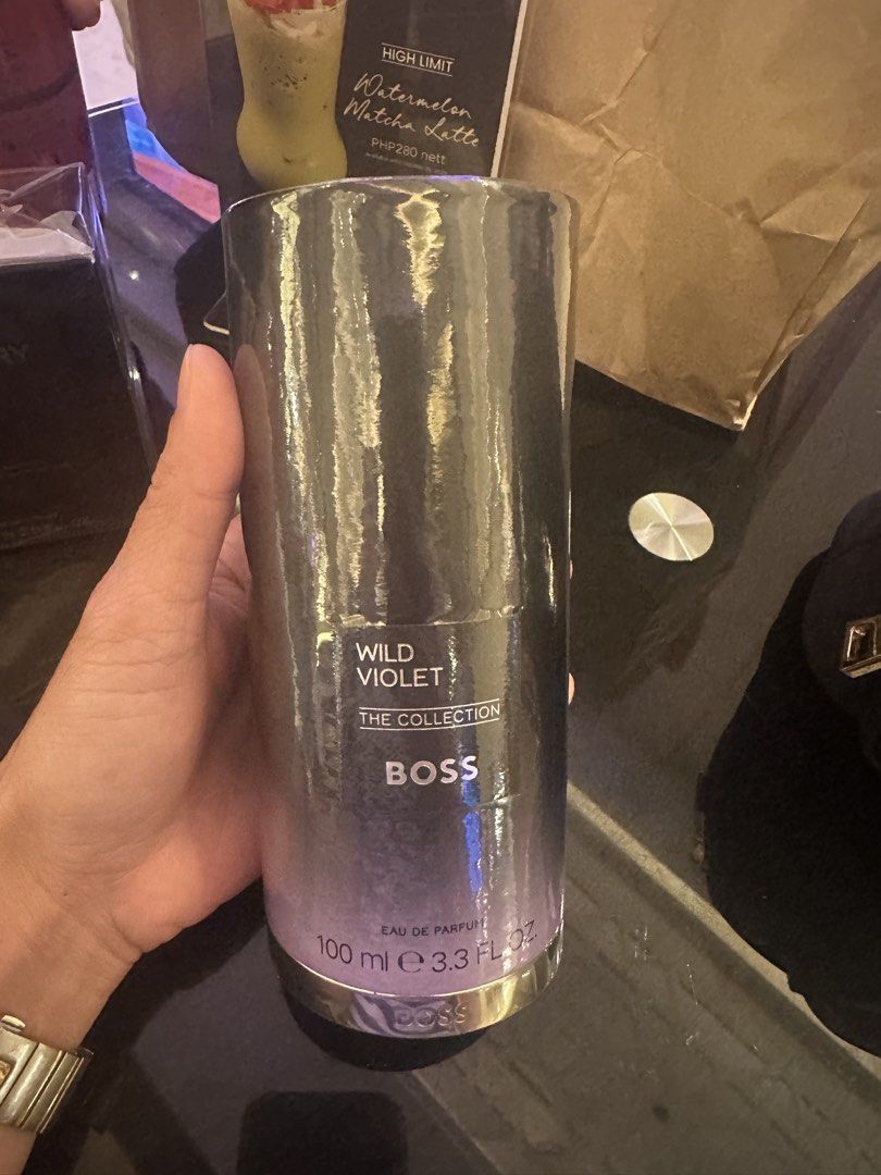 Boss The Collection Wild Violet Eau de Parfum 100ml (Category: Fragrance & Deodorants) located in Pasig City. Submitted by lizshoppe (Listing ID 1464751187, Image 1). Description: Authentic - Brand: Hugo Boss The Collection - Wild Violet - Type: Eau de Parfum (EDP) - Size: Large 100ml bottle - Condition: Brand new, sealed in protective plastic wrap - Design: Stunning shiny silver and purple gradient finish - Versatility: Ideal for daily wear or e