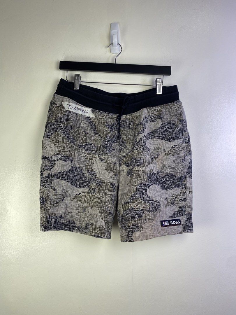 BOSS x NBA Camo Dot Shorts (Category: Shorts) located in Manila. Submitted by declutterpromax (Listing ID 1464601148, Image 1). Description: - Cool BOSS x NBA collaboration shorts - Unique camo dot pattern - Comfortable elastic waistband with drawstring - Features NBA BOSS logo patch on the side - Includes a back pocket with BOSS x NBA logo patch - Ideal for everyday casual wear or athletic activities.