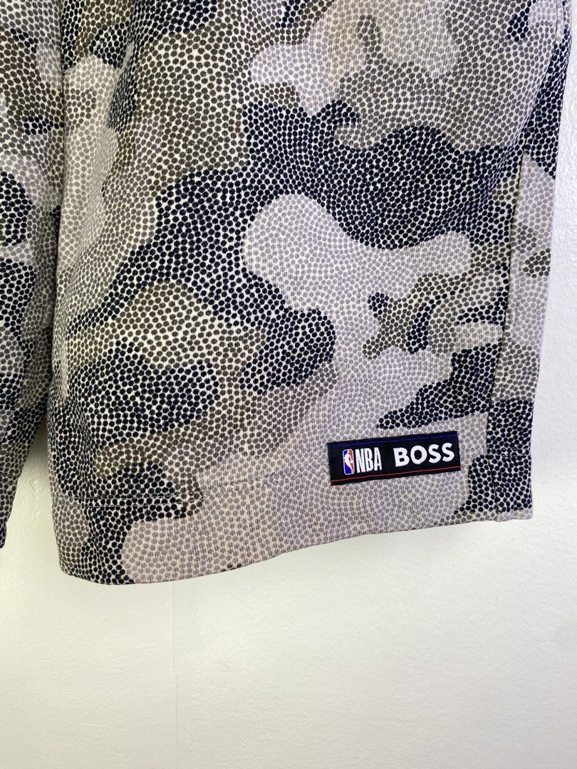 BOSS x NBA Camo Dot Shorts (Category: Shorts) located in Manila. Submitted by declutterpromax (Listing ID 1464601148, Image 2). Description: - Cool BOSS x NBA collaboration shorts - Unique camo dot pattern - Comfortable elastic waistband with drawstring - Features NBA BOSS logo patch on the side - Includes a back pocket with BOSS x NBA logo patch - Ideal for everyday casual wear or athletic activities.